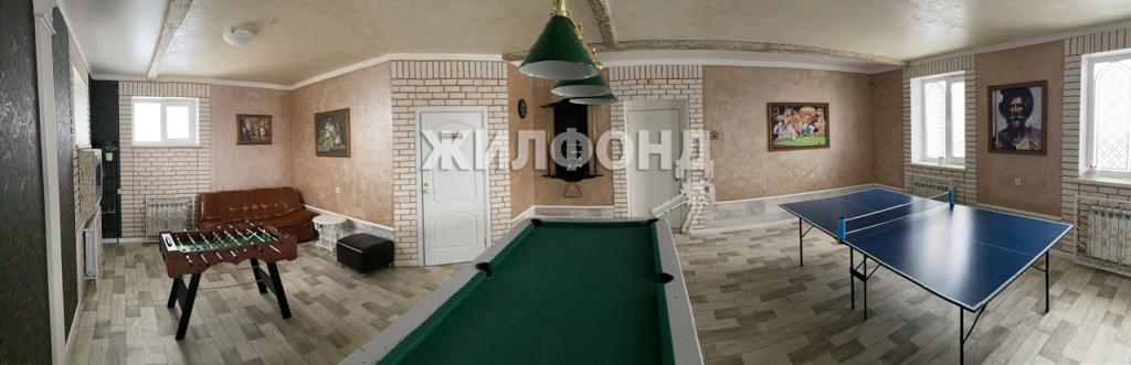 Фото Под Новосибирском продаётся коттедж в средневековом стиле за 40 млн рублей 3