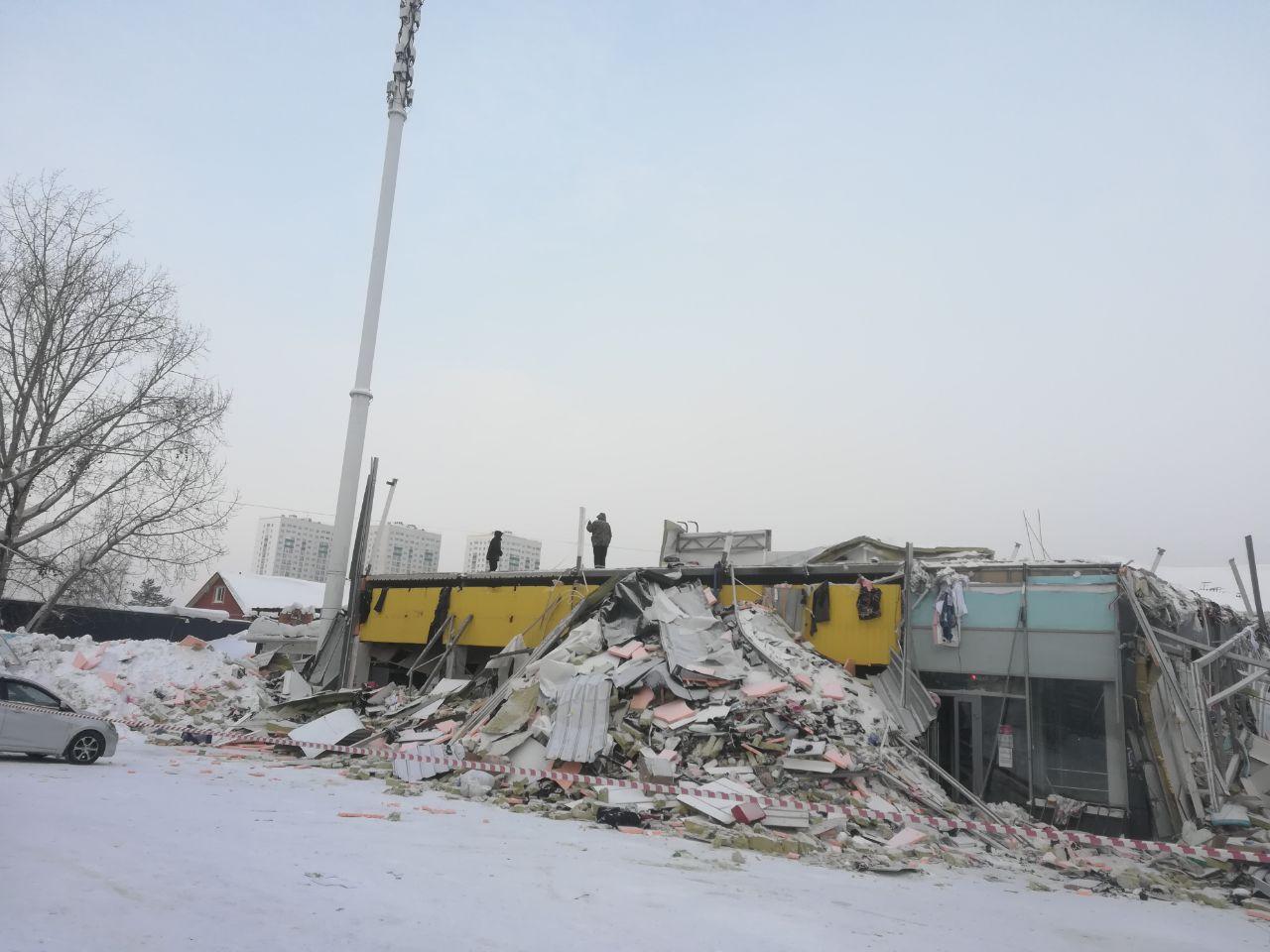 Фото Разрушенное здание и разбор завалов: что происходит на месте обрушения ТЦ на Матвеевке 22 января – страшные кадры после ЧП 14 - Сиб.ФМ Фото Разрушенное здание и разбор завалов: что происходит на месте обрушения ТЦ на Матвеевке 22 января – страшные кадры после ЧП 14