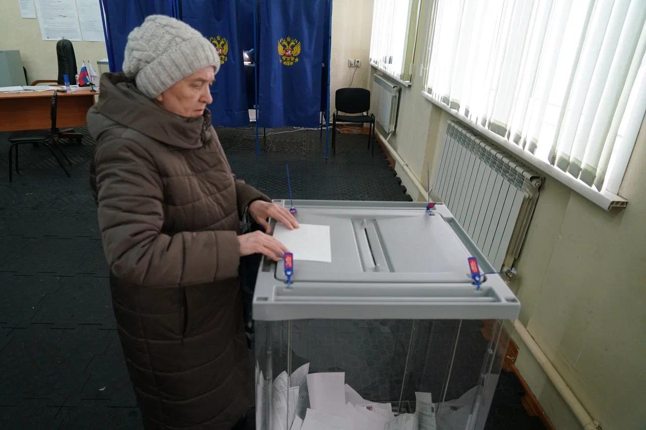 Фото Как в Новосибирске прошёл первый день выборов президента РФ — фоторепортаж 8